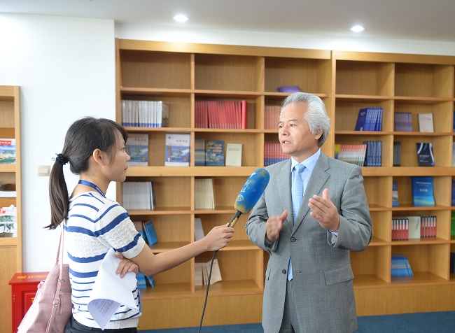 吴士存院长接受中新社专访